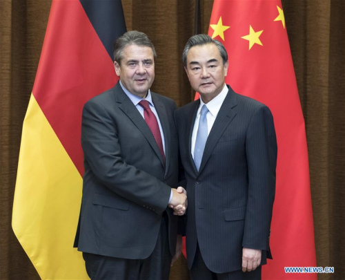 Chinese Foreign Minister Wang Yi (R) holds talks with German Vice Chancellor and Foreign Minister Sigmar Gabriel, in Beijing, capital of China, May 24, 2017. (Xinhua/Ding Haitao)