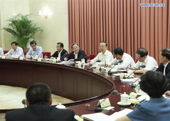 Yu Zhengsheng (4th L), chairman of the Chinese People's Political Consultative Conference (CPPCC) National Committee, presides over a biweekly consultation meeting to discuss how to better regulate the country's real estate market, especially ways to rein in speculation in metropolises and reduce stocks in small cities, in Beijing, capital of China, May 25, 2017. (Xinhua/Pang Xinglei)