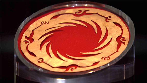 A gold foil featuring the sun and immortal birds is the symbol of Jinsha Site Museum in Chengdu, capital city of southwest China's Sichuan Province. (CGTN Photo)