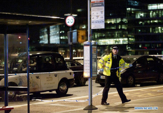 Police block off London Bridge after a terror attack in London, Britain, on June 4, 2017. Unidentified attackers drove a van into pedestrians on London Bridge Saturday night and stabbed people in the nearby Borough Market area. British authorities have classified the incidents as terrorist attacks. (Xinhua)