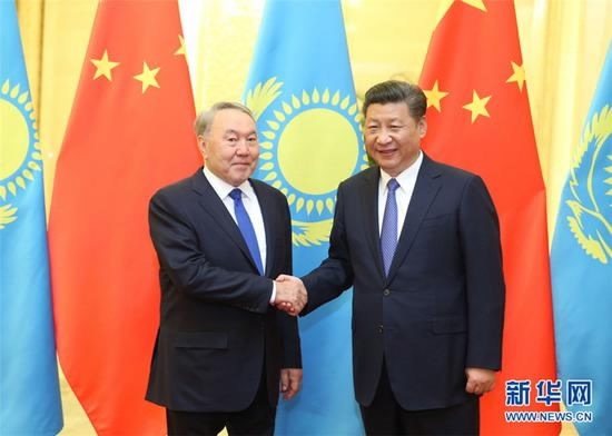 Chinese President Xi Jinping meets his Kazakh counterpart Nursultan Nazarbayev on the sidelines of the Belt and Road Forum on May 14 in Beijing.  (Photo/Xinhua)