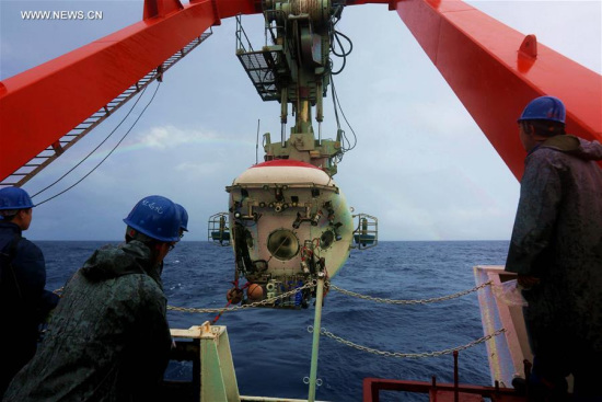 A double rainbow is seen over the sea from the China's manned submersible Jiaolong, which conducts its dive in Yap Trench, June 5, 2017.  (Xinhua/Liu Shiping)