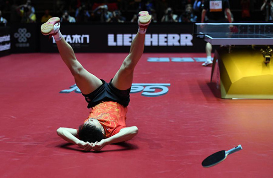 Ma Long of China celebrates after winning the men's singles final match against his compatriot Fan Zhendong at the 2017 World Table Tennis Championships in Dusseldorf, Germany, on June 5, 2017. (Photo/Xinhua)