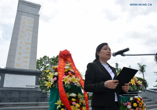 Lao Deputy Minister of Labor and Social Welfare Baikham Khattiya speaks during a completion ceremony of the repair project at the Chinese martyrs cemetery in Xieng Khuang province, Laos, on June 7, 2017. (Xinhua/Liu Ailun)