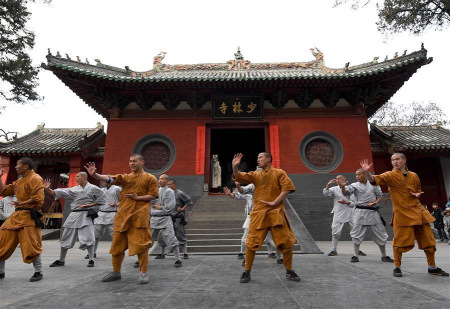 Monks practice martial arts at Shaolin Temple in central China's Henan Province, Jan. 20, 2017. Shaolin Temple is located at Songshan Mountain in Henan. As one of the cradles of Chinese Kungfu, it is the birthplace of the Shaolin martial arts. Monks here are famous for their Kungfu skills. (Xinhua/Li An)