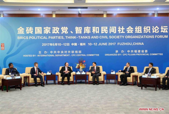 Liu Yunshan, a member of the Standing Committee of the Political Bureau of the Communist Party of China (CPC) Central Committee, meets with foreign representatives before the opening ceremony of the BRICS Political Parties, Think-tanks and Civil Society Organizations Forum in Fuzhou, capital of southeast China's Fujian Province, June 11, 2017. (Xinhua/Liu Weibing)