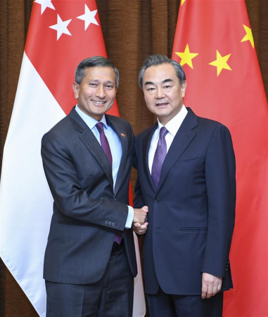 Chinese Foreign Minister Wang Yi (R) holds talks with his Singaporean counterpart Vivian Balakrishnan in Beijing, capital of China, June 12, 2017. (Xinhua/Zhang Ling)