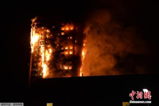A massive fire engulfs a 27-story apartment building in western London early Wednesday. (Photo/Agencies)