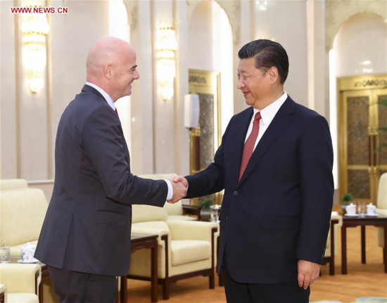 Chinese President Xi Jinping (R) meets with FIFA president Gianni Infantino in Beijing, capital of China, June 14, 2017. (Xinhua/Xie Huanchi)