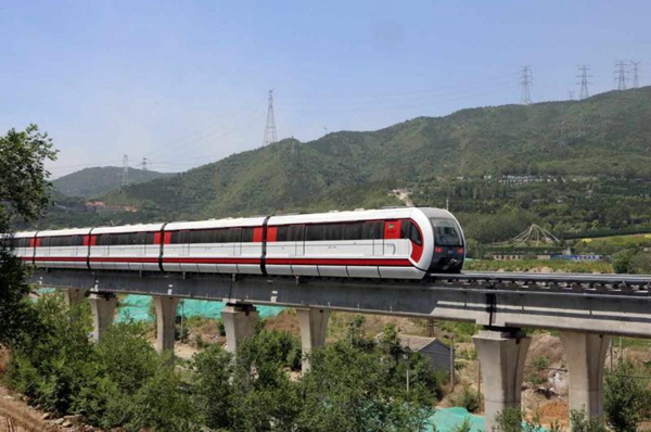 A maglev train undergoes testing recently on Beijing's new S1 line, which is scheduled to open later this year.Wu Kechao / For China Daily