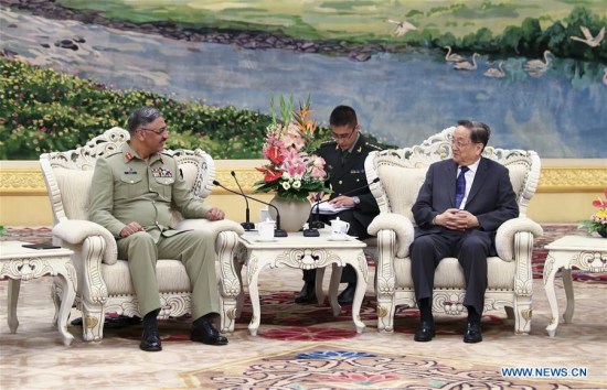 Yu Zhengsheng, chairman of the National Committee of the Chinese People's Political Consultative Conference, meets with Pakistan's Chairman of the Joint Chiefs of Staff Committee Zubair Mahmood Hayat in Beijing, capital of China, June 15, 2017. (Xinhua/Xie Huanchi)