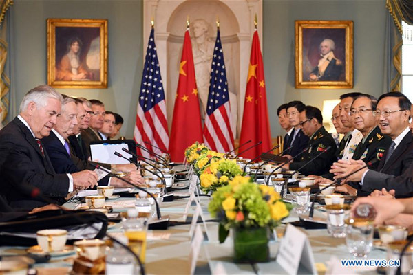 Chinese State Councilor Yang Jiechi (1st R) co-chairs a diplomatic and security dialogue with U.S. Secretary of State Rex Tillerson (1st L) and Secretary of Defense James Mattis (2nd L) as Fang Fenghui (2nd R), a member of China's Central Military Commission (CMC) and chief of the CMC Joint Staff Department, also participates in the dialogue in Washington D.C., the United States, on June 21, 2017. China and the United States began their first diplomatic and security dialogue on Wednesday at the U.S. State Department in Washington D.C. (Xinhua/Yin bogu)
