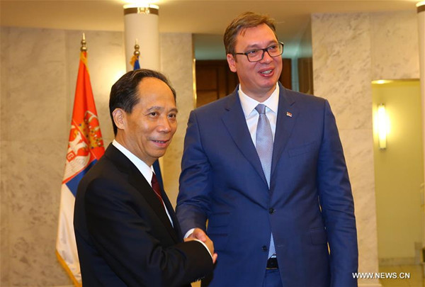 Ji Bingxuan (L), special envoy of Chinese President Xi Jinping and also vice chairman of the Standing Committee of the National People's Congress of China, China's top legislature, shakes hands with the newly-elected Serbian President Aleksandar Vucic during their meeting in Belgrade, capital of Serbia, on June 23, 2017. (Xinhua/Gong Bing)