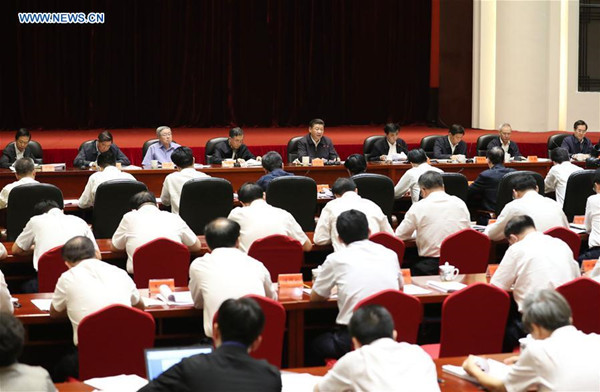 Chinese President Xi Jinping (C back) gives a speech while presiding over a symposium on poverty relief in Taiyuan, capital of north China's Shanxi Province, June 23, 2017. (Xinhua/Pang Xinglei)