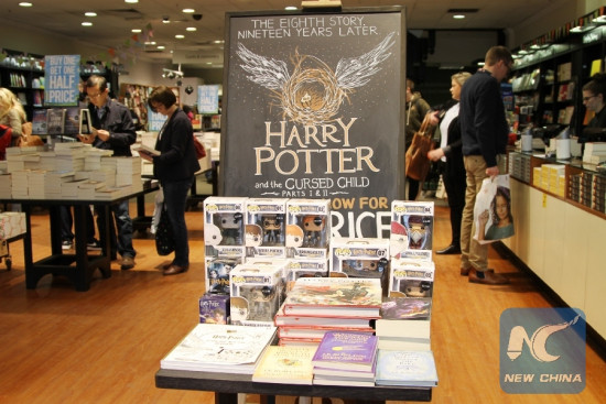 The new play Harry Potter and the Cursed Child which will debut in London this summer is promoted at a stand in a bookshop in Edinburgh, Britain, on April 23, 2016. (Xinhua/Guo Chunju)