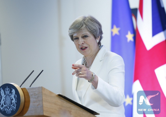 British Prime Minister Theresa May attends a press conference at the end of a two-day EU Summit in Brussels, Belgium, June 23, 2017. (Xinhua/Ye Pingfan)