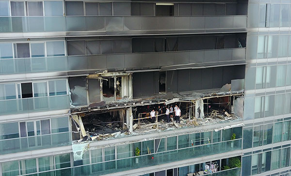 The apartment after the fire.(Dong Xuming/For China Daily)