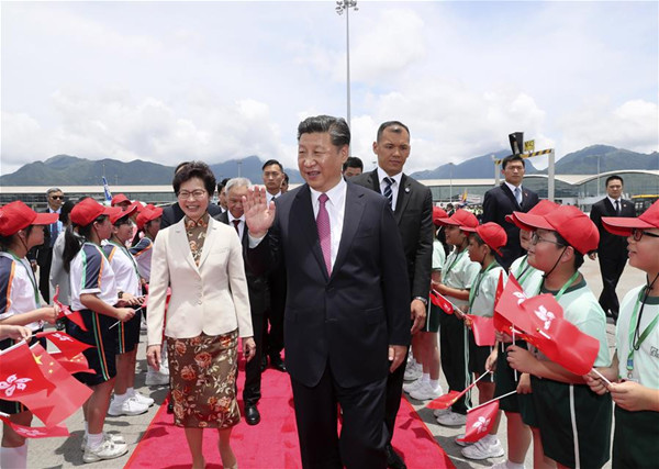 Chinese President Xi Jinping waves to the crowd at a see-off ceremony as he wraps up his Hong Kong visit, in Hong Kong, south China, July 1, 2017. (Xinhua/Lan Hongguang)