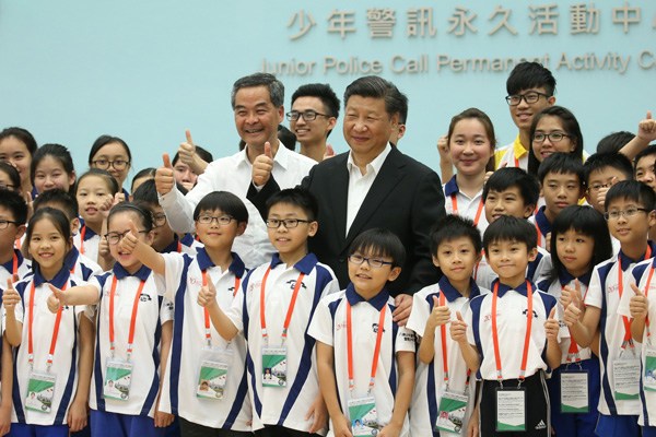 President Xi Jinping visits the Junior Police Call Permanent Activity Center and International Training Camp in Hong Kong on Friday. (Provided to China Daily)