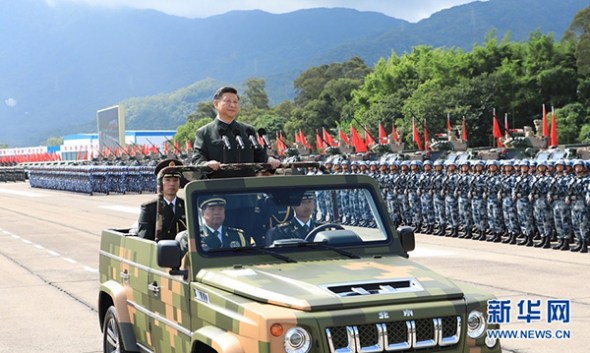President Xi Jinping inspects the garrison at the PLA's Shek Kong barracks in Hong Kong on Friday, the eve of the 20th anniversary of Hong Kong's return to China. (Photo/Xinhua)