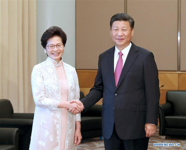 Chinese President Xi Jinping (R) meets with Lam Cheng Yuet-ngor shortly after she was sworn in as the Chief Executive of the Hong Kong Special Administrative Region, in Hong Kong, south China, July 1, 2017. (Xinhua/Ma Zhancheng)
