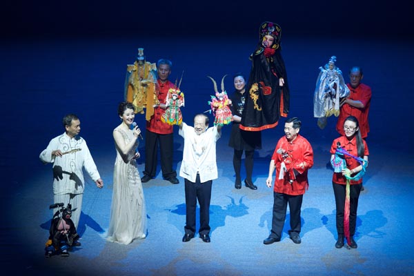 Artists from Taiwan and the mainland stage a puppet show during the Ninth Straits Forum in Xiamen, Fujian province, in June. Jiang Kehong / Xinhua