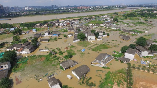 An area in Changsha, the capital of Hunan province, is flooded on Tuesday as a result of recent downpours. (Photo/China News Service)