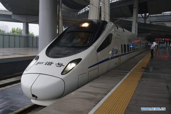 Bullet train D6655, which runs from Beijing, capital of China, to Baoding City in Hebei Province, leaves the Beijing South Railway Station in Beijing July 6, 2017. (Xinhua/Xing Guangli)