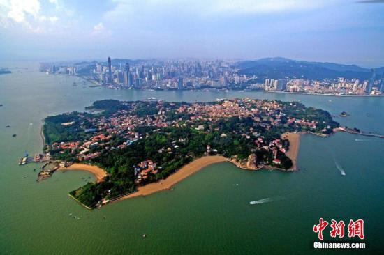 Aerial photo shows historic buildings on the Gulangyu island, southeast China's Fujian Province. Gulangyu island, famous for its varied architecture and multicultural history, was included on the UNESCO World Heritage list Saturday. (Xinhua/Jiang Kehong)