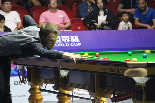 World number three Judd Trump builds another high break during England's quarterfinal with Northern Ireland at the 2017 Little Swan World Cup in Wuxi, Jiangsu province on July 8. (Photo provided to China Daily)