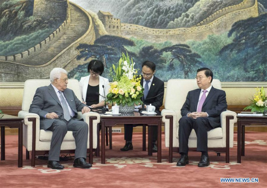 Zhang Dejiang, chairman of the Standing Committee of China's National People's Congress, meets with Palestinian President Mahmoud Abbas at the Great Hall of the People in Beijing, capital of China, July 20, 2017. (Xinhua/Li Tao)
