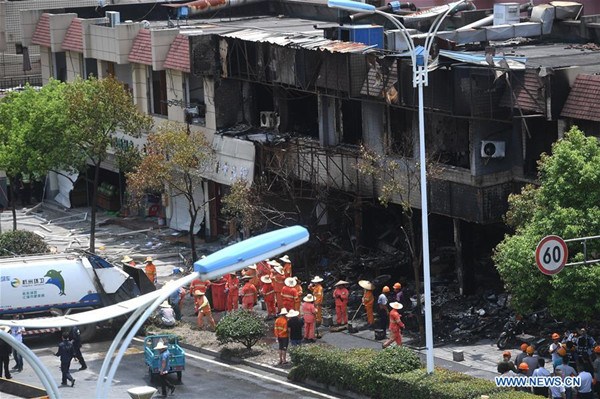 Photo taken on July 21, 2017 shows the general view of the blast site in Hangzhou of east China's Zhejiang Province. Local authorities said that two people were confirmed dead and 55 others injured after a blast occurred in a shop near the West Lake in the city. (Xinhua/Huang Zongzhi)