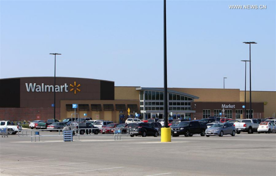 Photo taken on July 23, 2017 shows a Walmart parking area where an illegal immigrants' incident occurred in San Antonio, Texas, the United States. Eight people were found dead in a trailer carrying illegal immigrants at the Walmart parking area in southern Texas City of San Antonio early Sunday morning, authorities said. (Xinhua/Yan Bo)