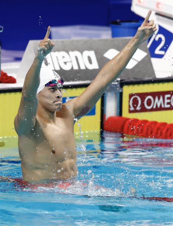 China's Sun Yang celebrates after the Men's 200m Freestyle final of swimming at the 17th FINA World Championships in Budapest, Hungary on July 25, 2017. Sun Yang won the gold medal with 1 minute and 44.39 seconds. (Xinhua/Ding Xu)