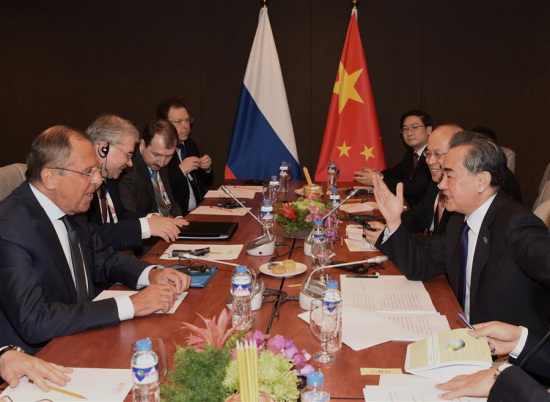 Chinese Foreign Minister Wang Yi (1st R) meets with his Russian counterpart Sergei Lavrov (1st L) on the sidelines of a series of ASEAN foreign ministers' meetings in Manila, the Philippines, Aug. 6, 2017. (Xinhua/Wang Shen)