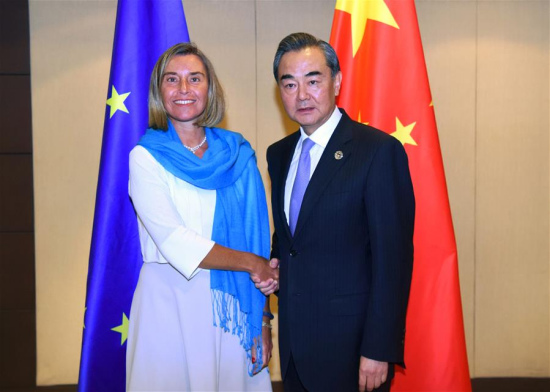 Chinese Foreign Minister Wang Yi (R) meets with European Union foreign policy chief Federica Mogherini on the sidelines of a series of ASEAN foreign ministers' meeting in Manila, the Philippines, Aug. 7, 2017. (Xinhua/Wang Shen)