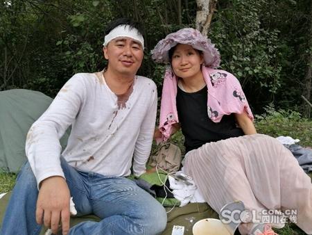 Kuang Yongbo and his wife Li Ya. (Photo/scol.com)