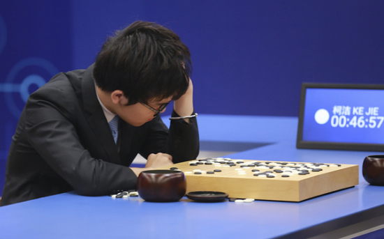 Ke Jie reflects on his play after losing the second game of his match with AlphaGo in Wuzhen, Zhejiang province, on Thursday. (Photo provided to China Daily)