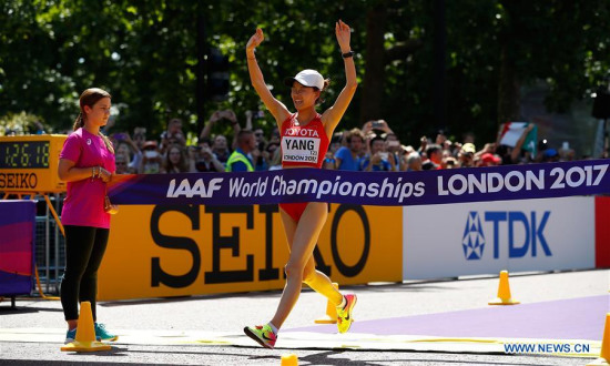 Yang Jiayu of China celebrates as she racing to the finish line during Women's 20km Race Walk on Day 10 of the 2017 IAAF World Championships in London, Britain, on Aug. 13, 2017. Yang Jiayu claimed the title with 1:26:18.(Xinhua/Wang Lili)