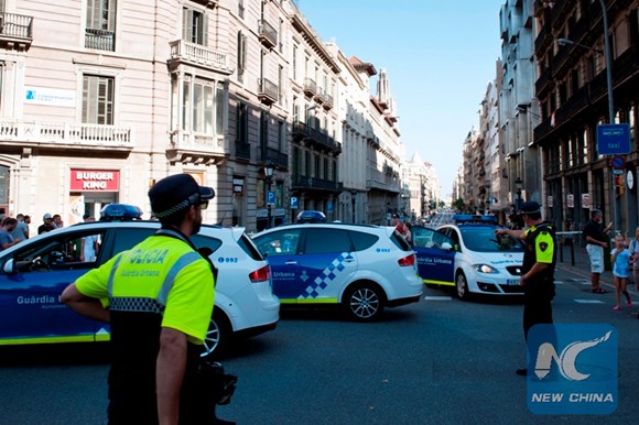 Police are seen in Barcelona city center around Las Ramblas following a terrorist attack. (Photo: Xinhua/Pau Barrena)