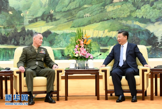 Chinese President Xi Jinping speaks to U.S. Chairman of the Joint Chiefs of Staff Joseph Dunford during a meeting at the Great Hall of the People in Beijing, China, August 17, 2017. (Photo/Xinhua)