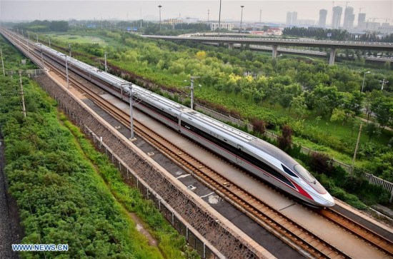 Fuxing train C2001 is seen arriving at Tianjin Railway Station, Aug. 21, 2017. China's new-generation bullet trains, the Fuxing, were put into operation on the Beijing-Tianjin Intercity Railway Aug. 21. (Xinhua/Yang Baosen)
