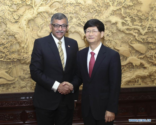 Meng Jianzhu, head of the Commission for Political and Legal Affairs of the Communist Party of China (CPC) Central Committee, meets with Singapore's Chief Justice Sundaresh Menon, in Beijing, capital of China, Aug. 22, 2017. (Xinhua/Pang Xinglei)