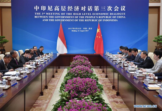 Chinese State Councilor Yang Jiechi and visiting Indonesian Coordinating Minister for Economic Affairs Darmin Nasution co-chair the third meeting of the high-level economic dialogue between China and Indonesia in Beijing, capital of China, Aug. 22, 2017. (Xinhua/Yan Yan)