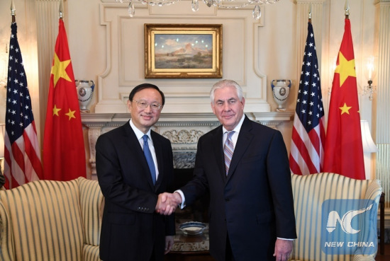 Chinese State Councilor Yang Jiechi (L) shakes hands with U.S. Secretary of State Rex Tillerson during their meeting in Washington D.C., the United States, on Feb. 28, 2017. (Xinhua/Yin Bogu)(File photo)