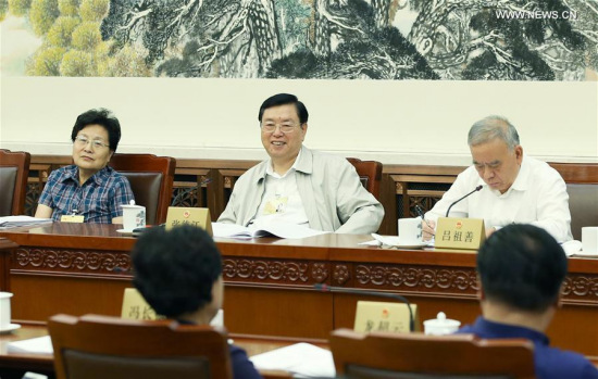 Zhang Dejiang (C), chairman of the Standing Committee of the National People's Congress (NPC), attends a session of the 12th NPC Standing Committee, in Beijing, capital of China, Aug. 28, 2017. The session deals with draft laws on nuclear safety, promotion of small and medium-sized enterprises and the national anthem. (Xinhua/Yao Dawei)