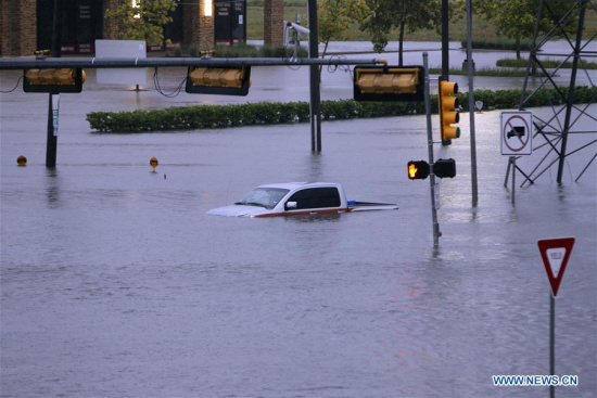 Vehicles are submerged in flood in great Houston area, Texas, the United States, Aug. 27, 2017 as the Hurricane Harvey made its strong landfall over the Texas Gulf Coast Friday night. (Xinhua/Song Qiong)