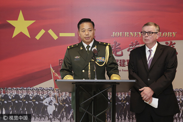 Major General Huang Xueping, head of the Military Staff Committee of China's Permanent Mission to the UN, speaks at the opening of the Journey of Glory photo exhibition. (Liao Pan/China News Service) 