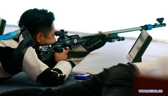 Yang Haoran competes during the 50m rifle three positions qualification round of men's Shooting at 13th Chinese National Games in north China's Tianjin Municipality, Aug 31, 2017. Yang Haoran surpassed the world record by three points with a score of 1189 points. (Xinhua/Wang Lili)