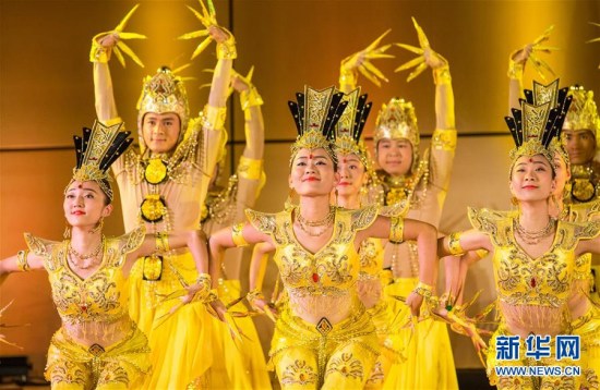 Artists of China Disabled People's Performing Art Troupe perform thousand-hand Bodhisattva at Palais des Nations in Geneva, Switzerland, Aug. 31, 2017. (Xinhua/Xu Jinquan)